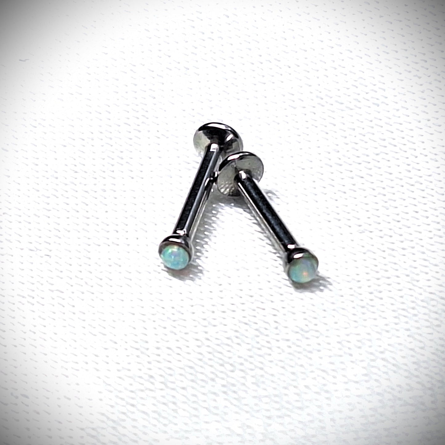 Push in Flat Backed stud with WHITE 2mm or 3mm Opal stone. 5mm, 6mm, 7mm, 8mm, 9mm, 10mm, 11mm, 12mm