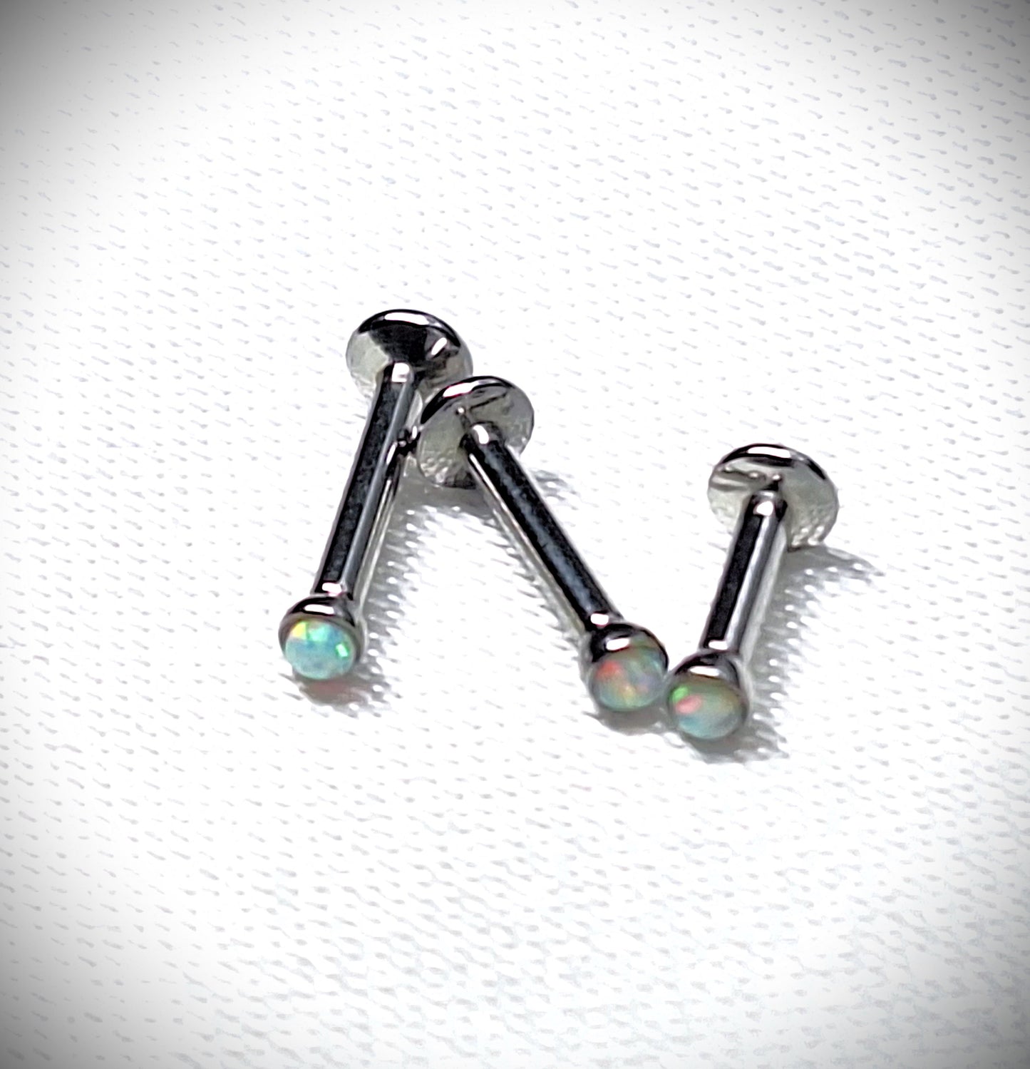 Push in Flat Backed stud with WHITE 2mm or 3mm Opal stone. 5mm, 6mm, 7mm, 8mm, 9mm, 10mm, 11mm, 12mm