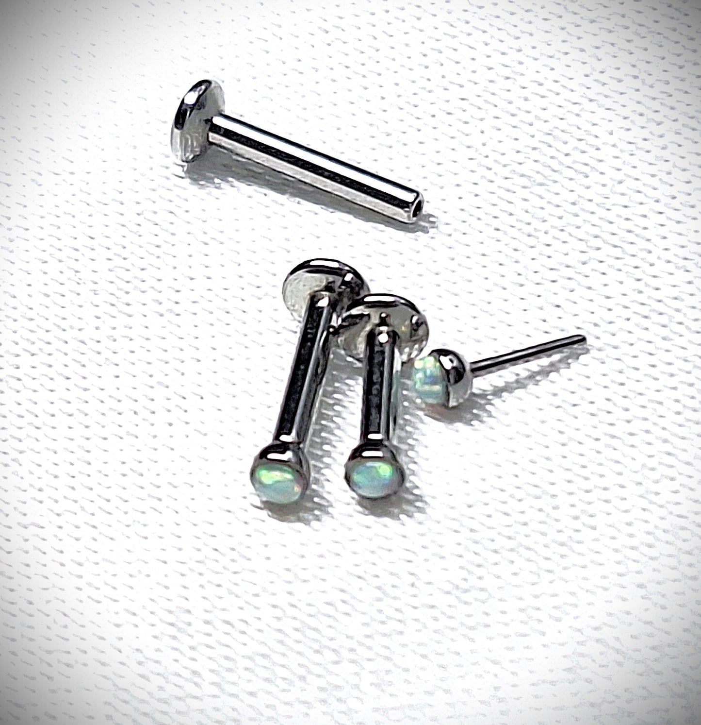 Push in Flat Backed stud with WHITE 2mm or 3mm Opal stone. 5mm, 6mm, 7mm, 8mm, 9mm, 10mm, 11mm, 12mm