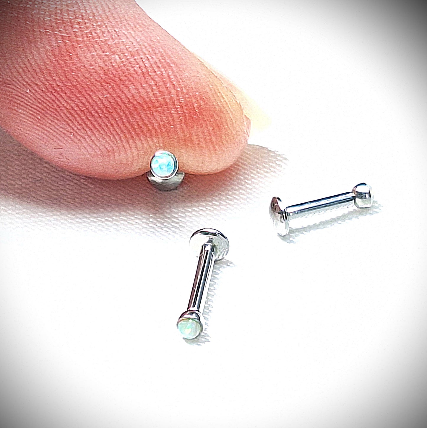 Push in Flat Backed stud with WHITE 2mm or 3mm Opal stone. 5mm, 6mm, 7mm, 8mm, 9mm, 10mm, 11mm, 12mm