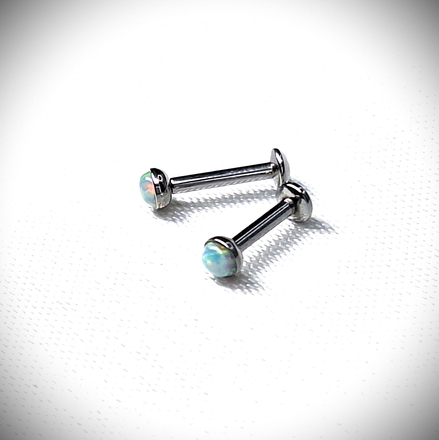 Push in Flat Backed stud with WHITE 2mm or 3mm Opal stone. 5mm, 6mm, 7mm, 8mm, 9mm, 10mm, 11mm, 12mm