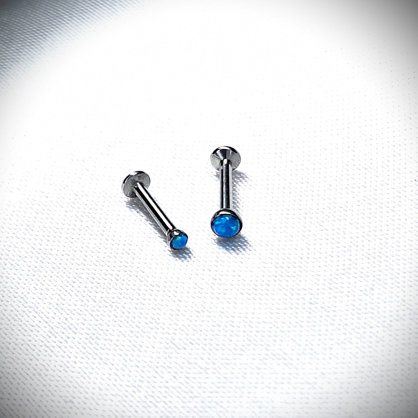 Push in Flat Backed stud with BLUE 2mm or 3mm Opal stone. 5mm, 6mm, 7mm, 8mm, 9mm, 10mm, 11mm, 12mm, 20ga, 18ga, 16ga