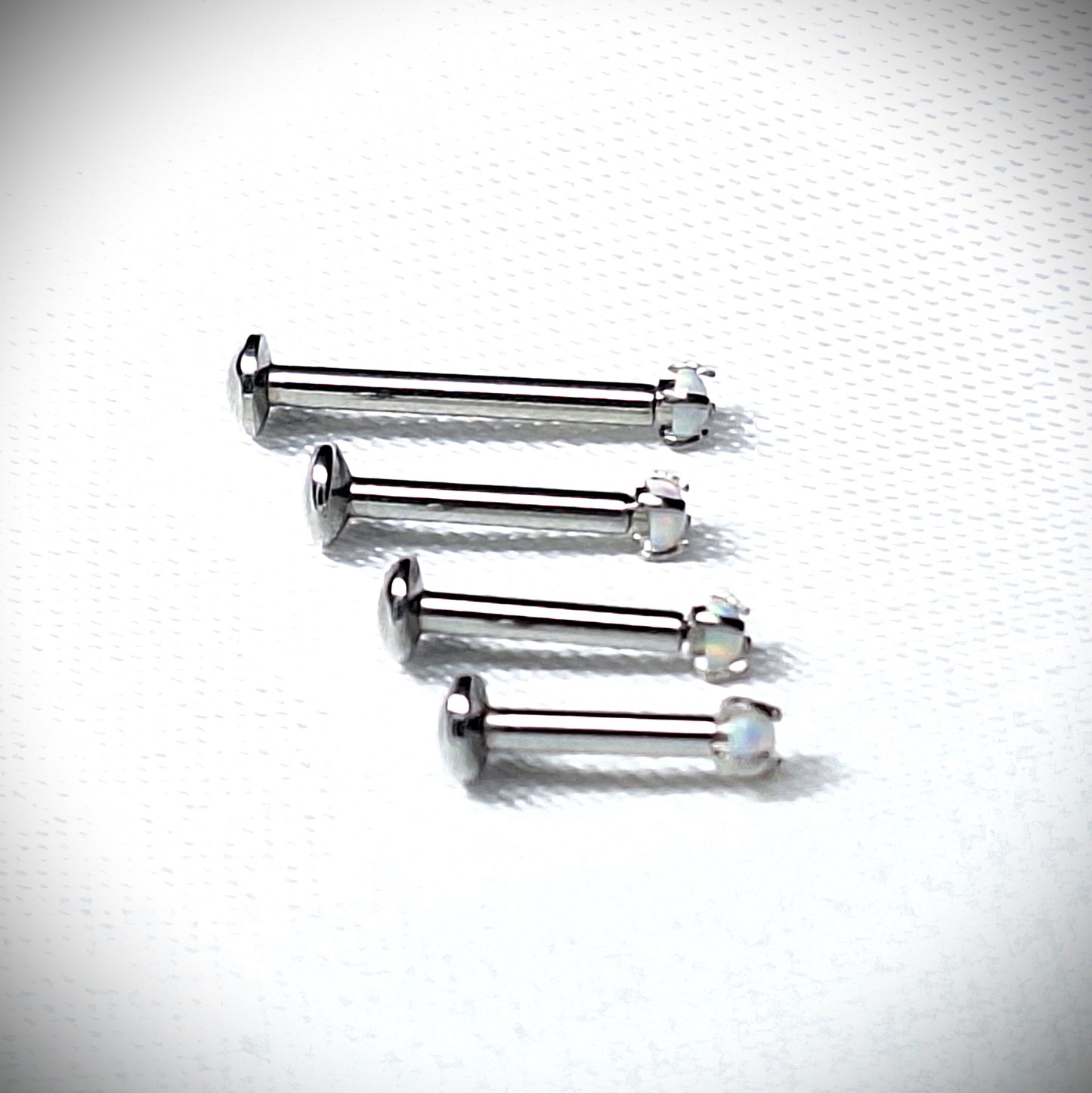 Push in Flat Backed stud with Prong Set WHITE 2mm or 3mm Opal stone. 5mm, 6mm, 7mm, 8mm, 9mm, 10mm, 11mm, 12mm, 20ga, 18ga, 16ga